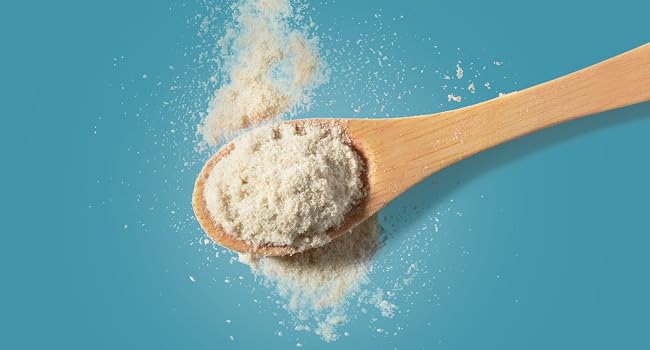 Nutrim powder in wooden sppon